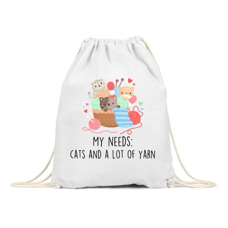 Kittens and ball of yarn